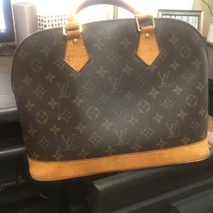 Authenic Louis Vuitton, ALMA Handbag,with dust bag